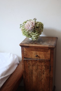 hydrangeas and antique bedside table