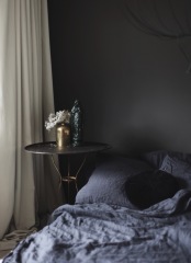 Moody bedroom painted with Farrow & Ball Tanner's Brown