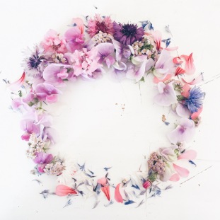 colorful summer flower wreath made with cornflower, cornflowers, sweetpea