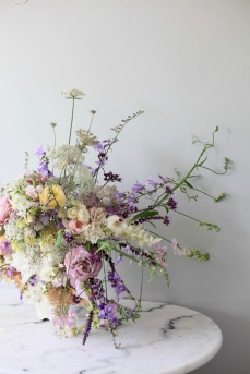 pastel summer flower arrangement with white hydrangea, roses, Queen Anne's lace, foxgloves, heuchera and everlasting pea // stylist Anastasia Benko