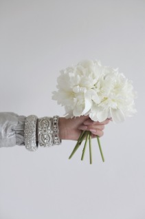 white peonies, floral arrangement, diamond bracelets