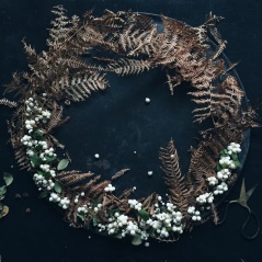 moody wreath with snowberries and dried fern